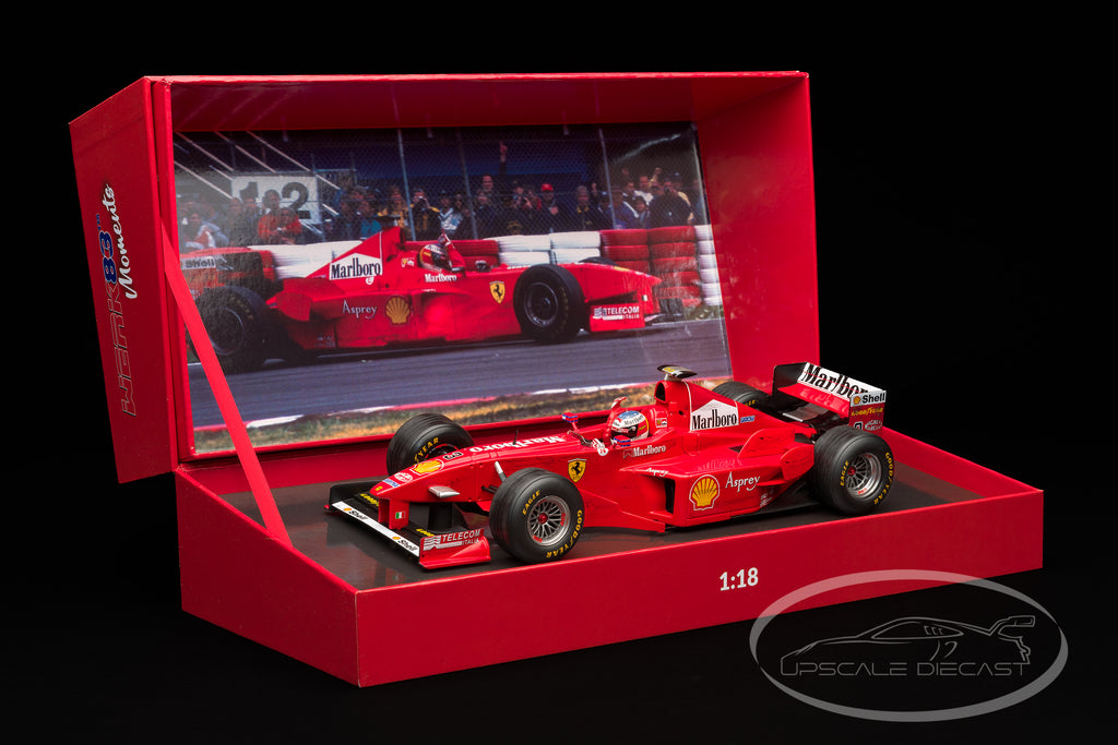 WERK83 1:18 Ferrari F300 Michael Schumacher 1998 Canadian GP winner front three-quarter view in display box