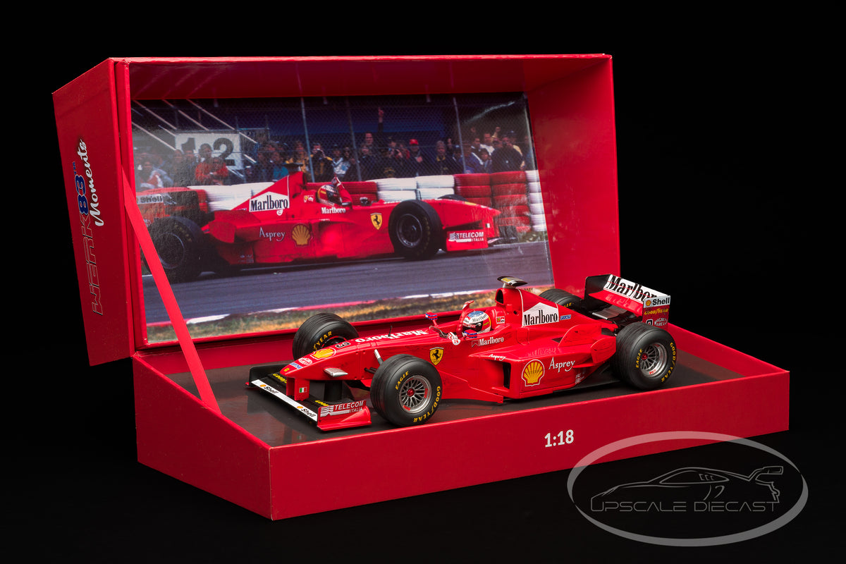 WERK83 1:18 Ferrari F300 Michael Schumacher 1998 Canadian GP winner front three-quarter view in display box